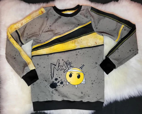 Weiches Bio Baumwoll French Terry Stoff Panel von Niggis Handmade mit dem Design "NinjaSmiley" von GroWidesign zum vernähen. Ideal für Sweatjacken, Hoodies oder andere Kleidungsstücke.